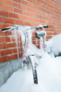Frozen bike covered in ice